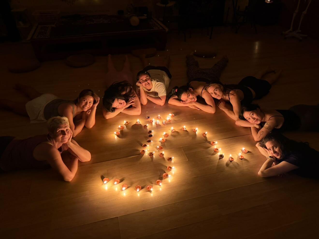 Yoga students in meditation with Om mudra, Upekkha online YTT